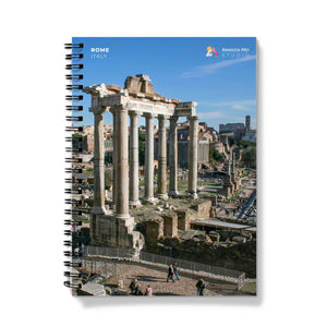 a spiral notebook with a view of the ruins of the ancient city of rome
