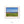 A red house sits on a grassy field, overlooking a body of water and a blue sky with clouds.