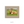 A brown Highland cow is resting on a grassy hillside in the image.