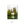 A white church with a steeple sits on the shore of a calm lake, surrounded by lush greenery.