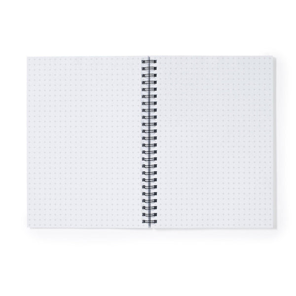 a spiral notebook on a white background