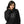 A young woman with dark hair is smiling and posing for the camera, wearing a black hoodie with a white graphic of a camera on it.