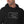 A man wearing a black hoodie with a white camera design printed on it.